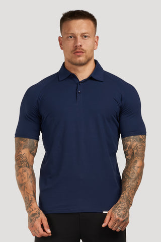 THE MUSCLE BUTTON POLO